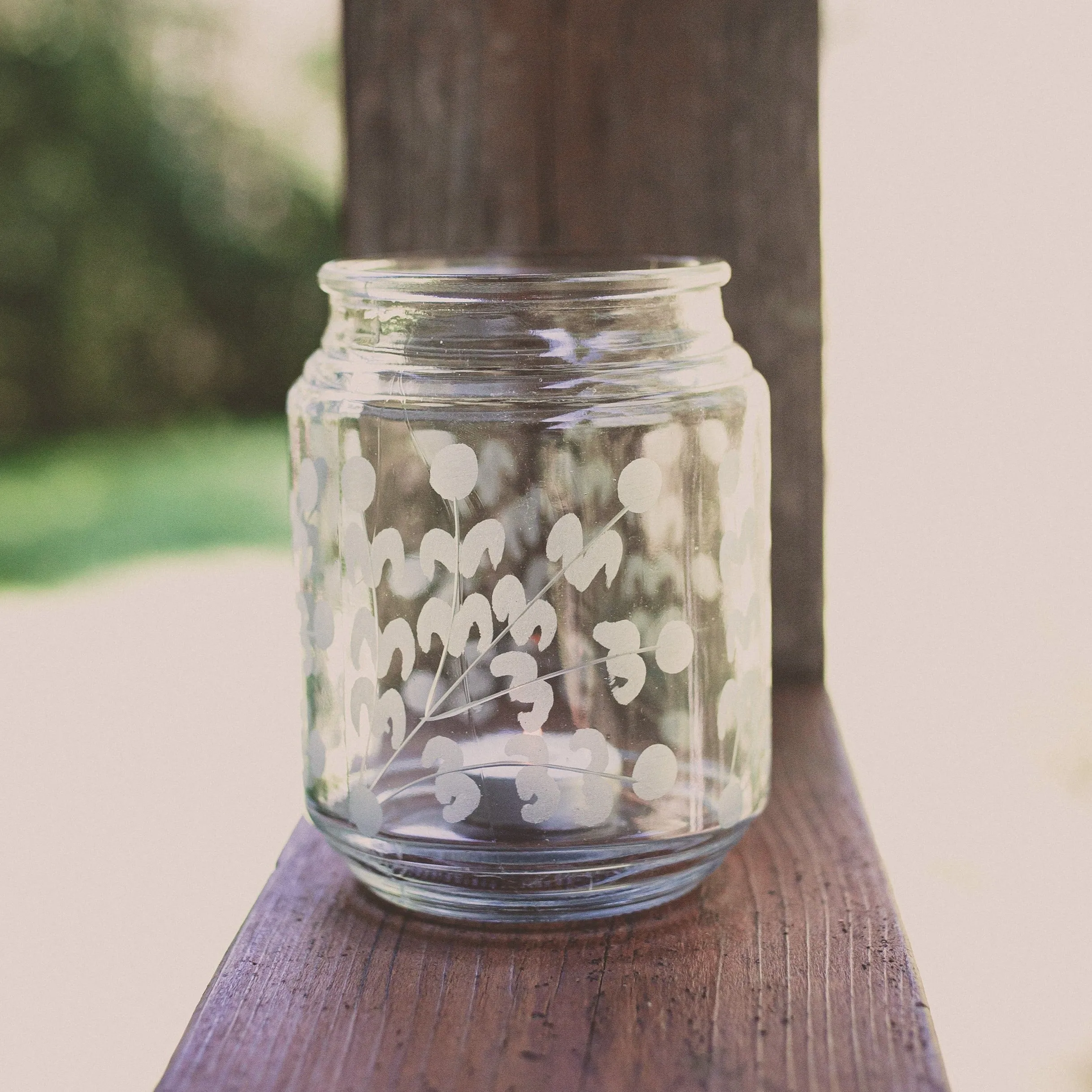 Clear Jar with Flowers